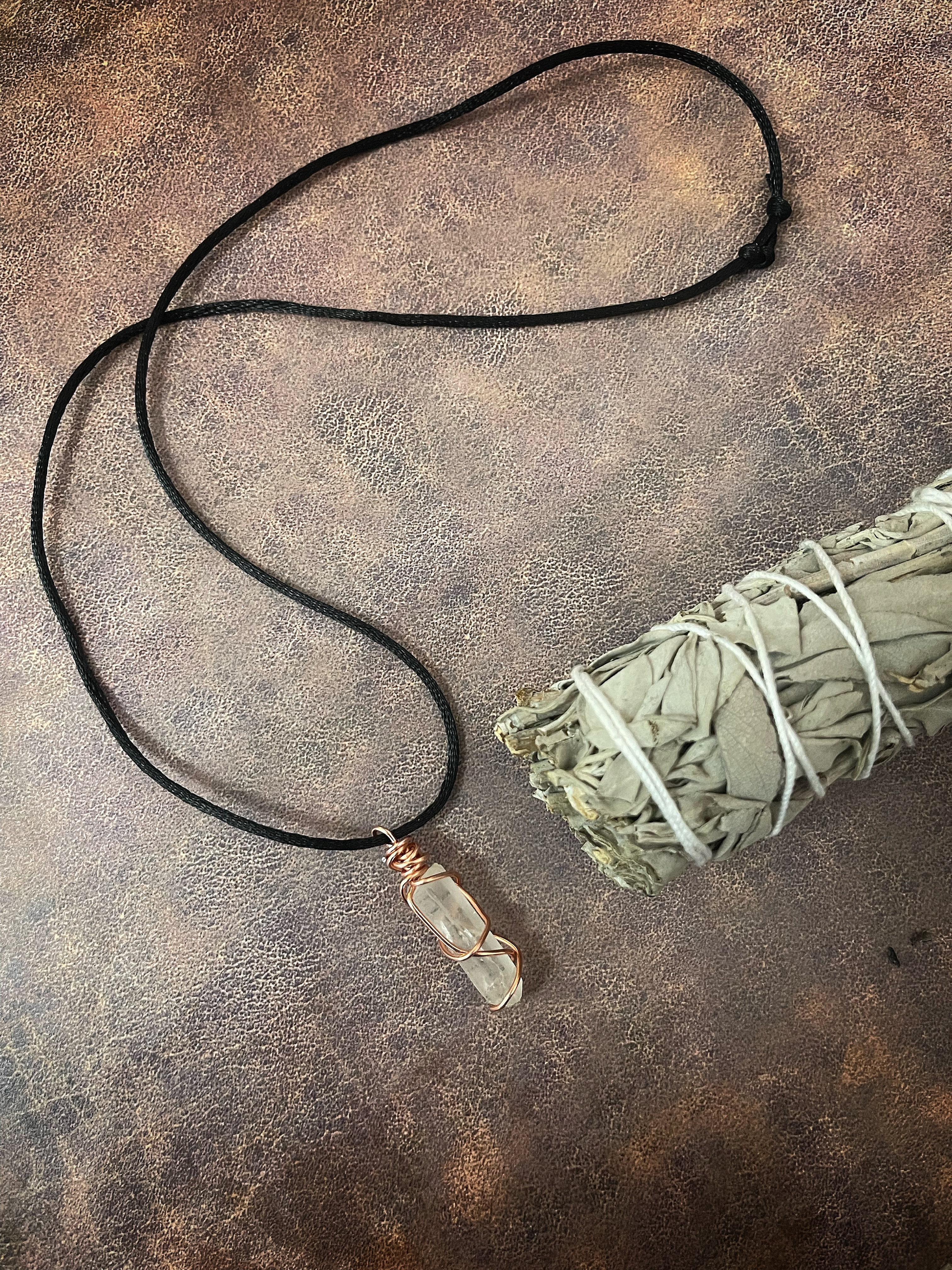This Clear Quartz hand wrapped in ete inalum is made with love by The Herbal Oracle! Shop more unique gift ideas today with Spots Initiatives, the best way to support creators.