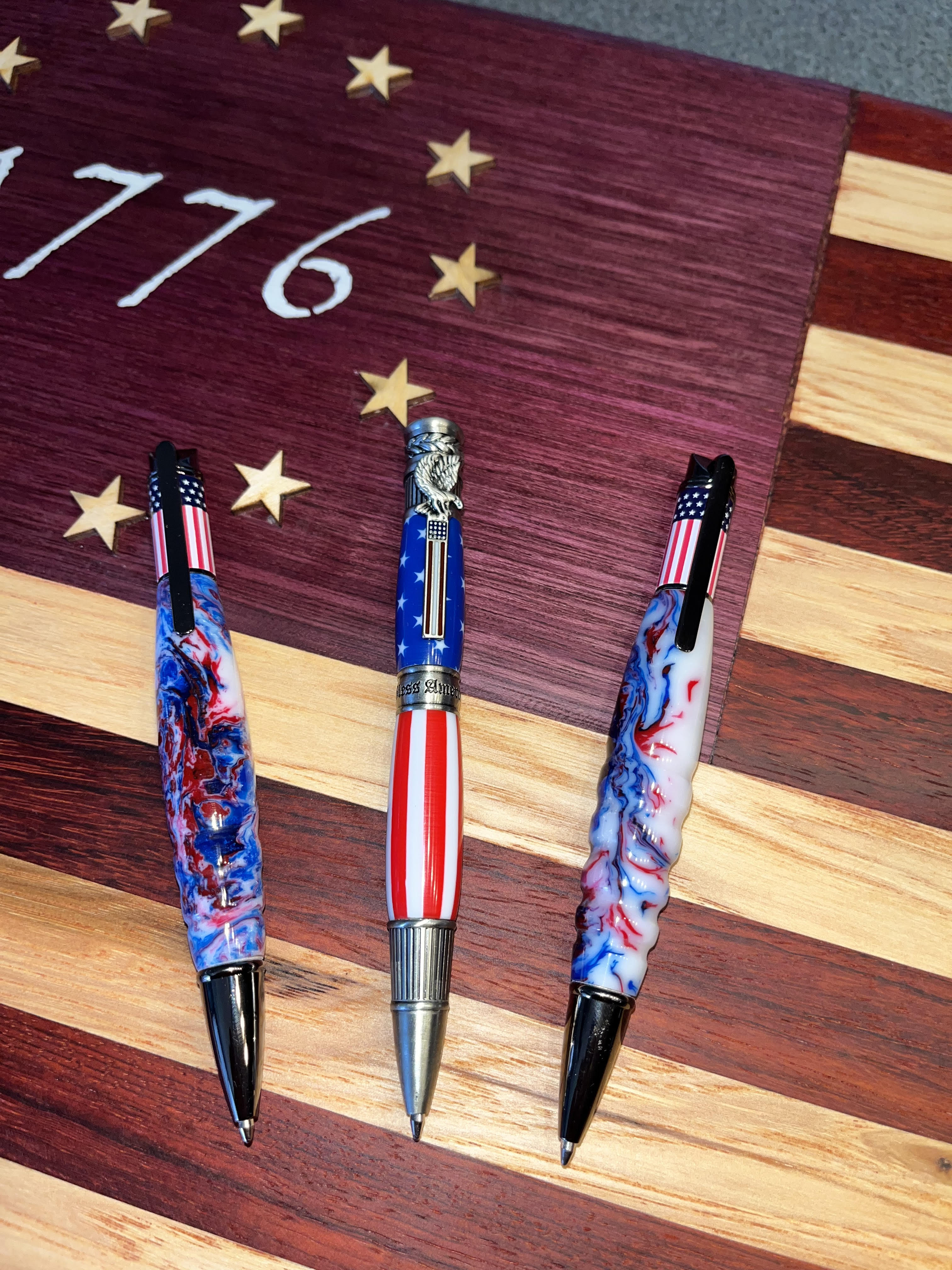 Hey! Show your patriotism with one of our beautifully handmade pens and our gorgeous flags!