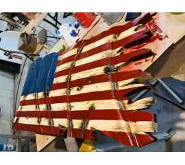 This Wavy tattered flag is made with love by PTSD Woodwork and Crafts! Shop more unique gift ideas today with Spots Initiatives, the best way to support creators.