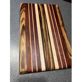 This Cutting board is made with love by PTSD Woodwork and Crafts! Shop more unique gift ideas today with Spots Initiatives, the best way to support creators.