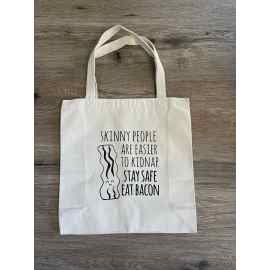This Skinny People are easier to kidnap - tote is made with love by The Herbal Oracle! Shop more unique gift ideas today with Spots Initiatives, the best way to support creators.